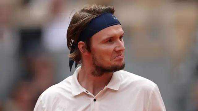 Alexander Bublik looks on