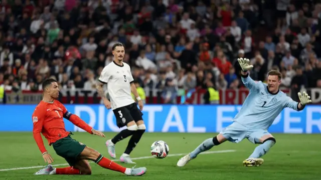 Cristiano Ronaldo goes close