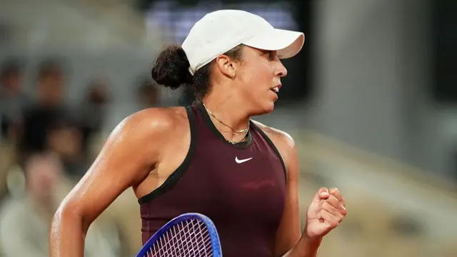 Madison Keys reacts after winning a set