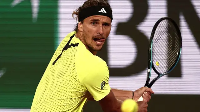 Alexander Zverev plays a backhand return