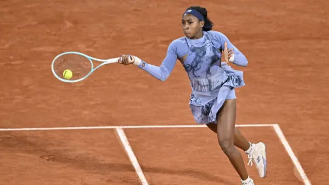 Coco Gauff hits a forehand