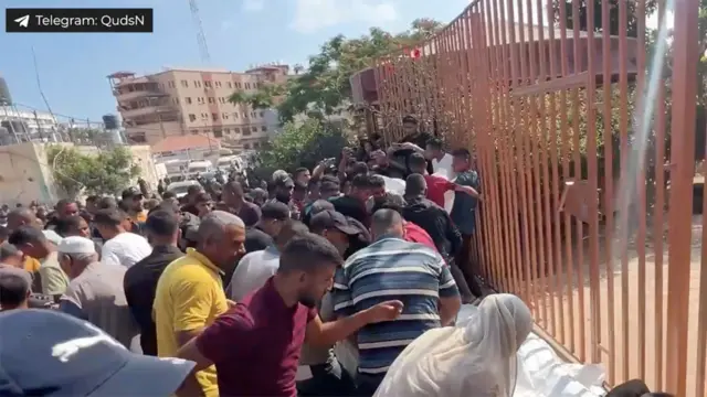 A crowd of Palestinians seen after the reported attack