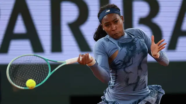 Coco Gauff plays a forehand