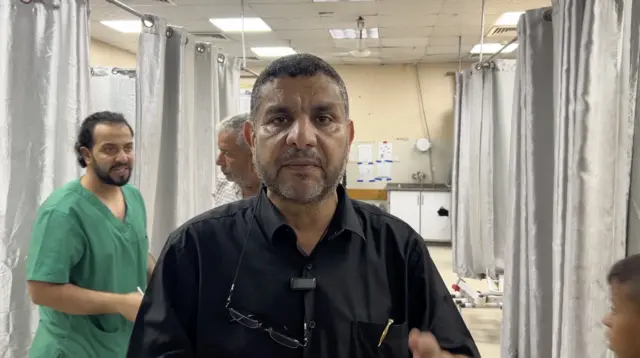 Dr Marwan Shafiq al-Hams stands in Gaza hospital.