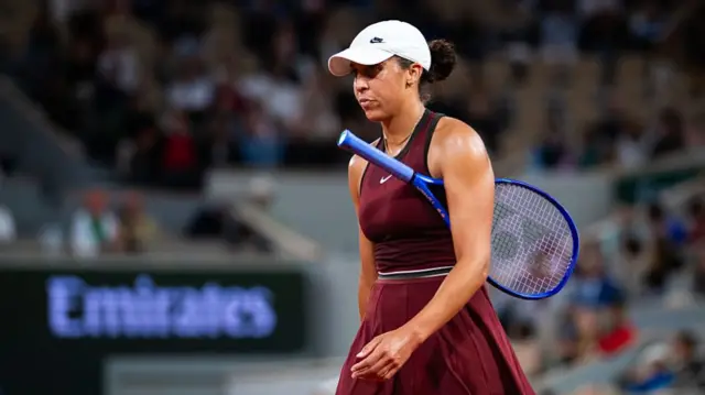 Madison Keys walks off court