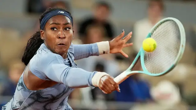 Coco Gauff plays a backhand return