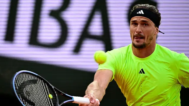 Alexander Zverev plays a forehand return