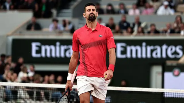 Novak Djokovic reacts after a point