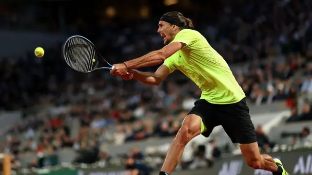 Alexander Zverev plays a backhand