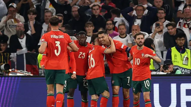 Ronaldo (centre) celebrates his goal