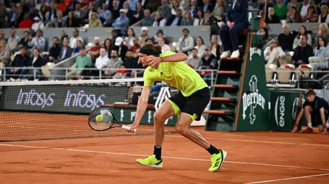 Alexander Zverev of Germany plays a backhand