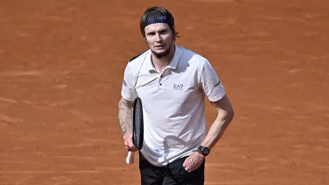 Aleksandr Bublik looks on