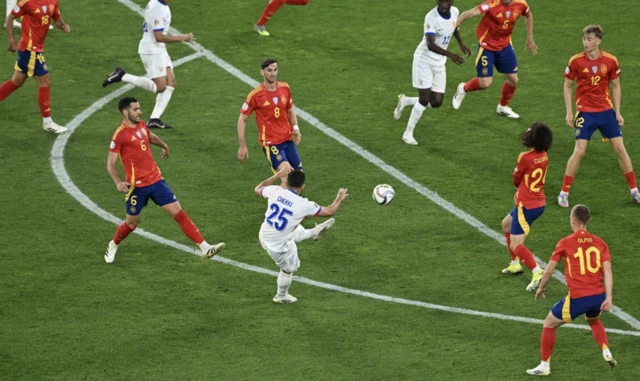 France's Rayan Cherki scores their second goal