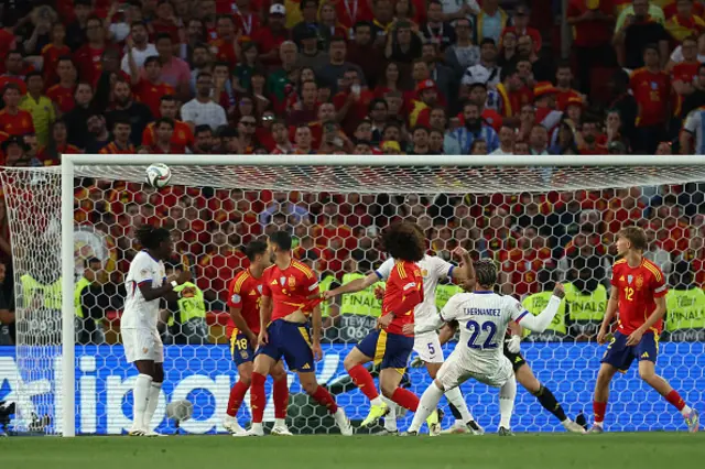 Theo Hernandez (2nd R) puts a shot over the bar
