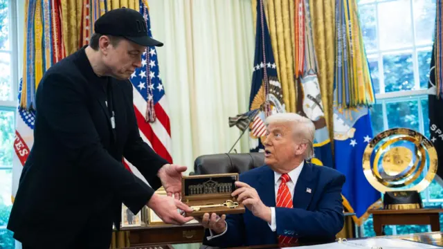 Trump hands Musk a golden key in the Oval Office.