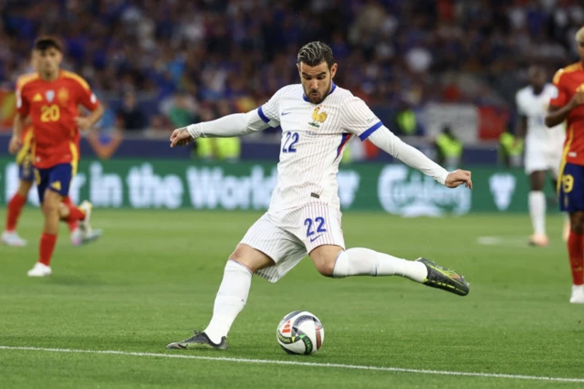 France's Theo Hernandez shoots at goal