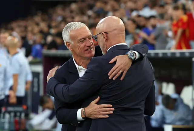 Didier Deschamps, Manager of France, interacts with Luis de la Fuente