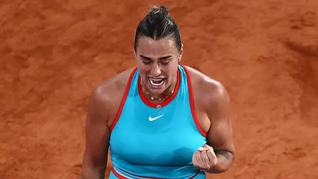 Aryna Sabalenka reacts after a point