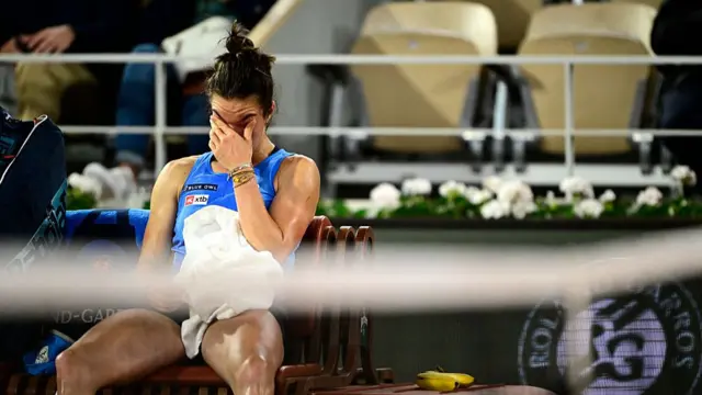 Lois Boisson reacts as she sits on the bench