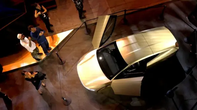 Tesla's robotaxi is displayed at an unveiling event in Los Angeles, California