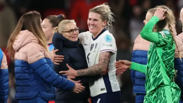 Sarina Wiegman and Millie Bright