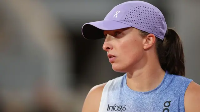 Iga Swiatek of Poland looks on