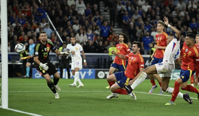 Spain's Dani Vivian scores an own goal and France's third