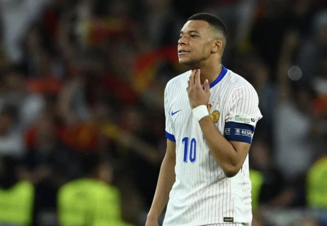 France's Kylian Mbappe reacts
