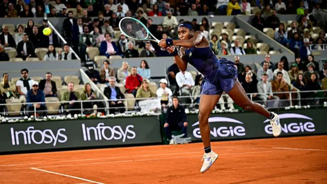 Coco Gauff plays a backhand return