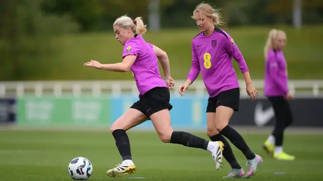 Alessia Russo and Aggie Beever-Jones training for England