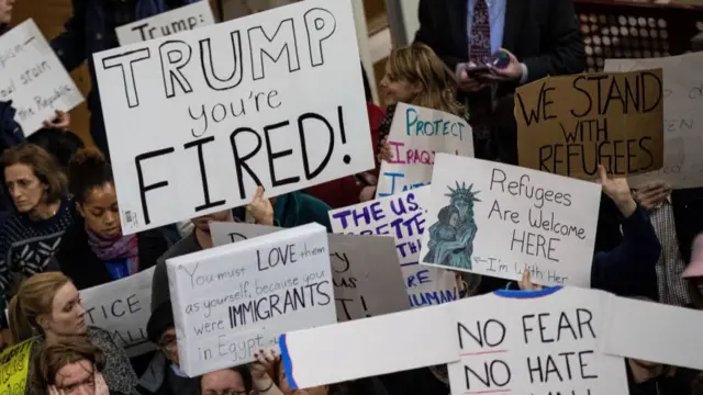 Protestors rally against President Donald Trump's recent executive order halting refugee admissions for 120 days and banning entry to the U.S. for citizens of seven predominantly-Muslim nations, at Reagan National Airport, February 1, 2017