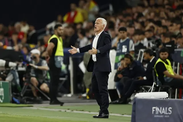 Didier Deschamps looks on