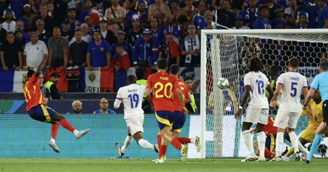 Spain's Nico Williams scores their first goal