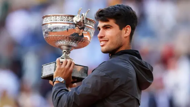 Carlos Alcaraz with the French Open trophy