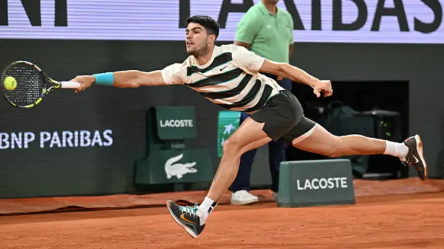 Carlos Alcaraz of Spain competes