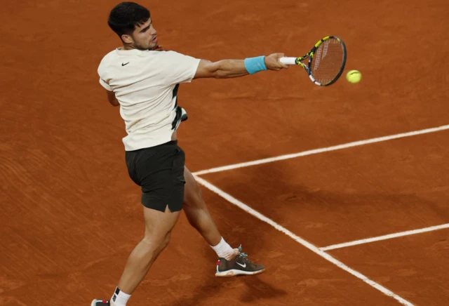 Spain's Carlos Alcaraz in action during his semi final match against Italy's Lorenzo Musetti