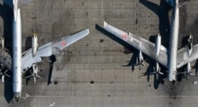 A second picture of planes is seen above, the two planes have wings that are slightly blurry.