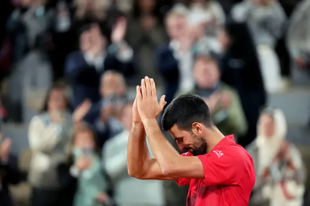 Serbia's Novak Djokovic waves to the crowd