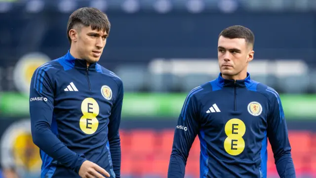 Kieron Bowie and Lennon Miller warm up