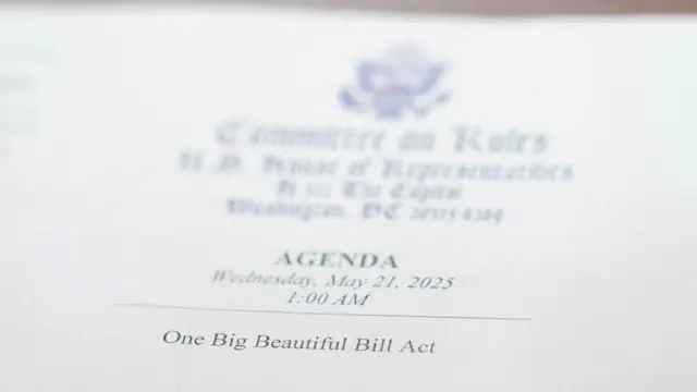 A view of an agenda with the words "One Big Beautiful Bill Act" printed on it, on the day of a House Rules Committee's hearing on U.S. President Donald Trump's plan for extensive tax cuts, on Capitol Hill, in Washington, D.C., U.S., 21 May