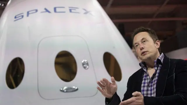 SpaceX CEO Elon Musk speaks after unveiling the Dragon V2 spacecraft in Hawthorne, California