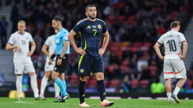 John McGinn looks dejected