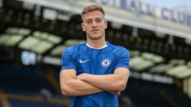 Liam Delap of Chelsea poses for a photo as Chelsea unveil him as a new signing