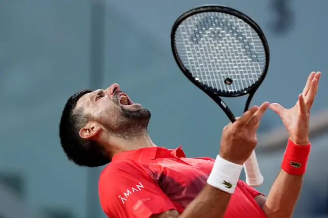 Serbia's Novak Djokovic reacts