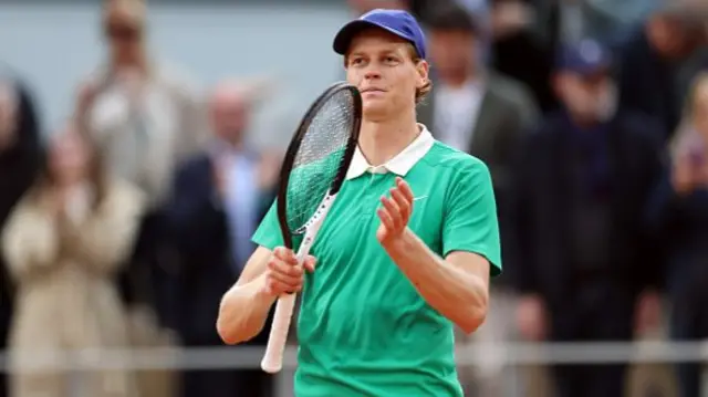 Jannik Sinner of Italy celebrates victory