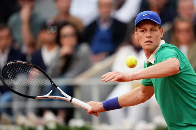 Italy's Jannik Sinner plays a forehand
