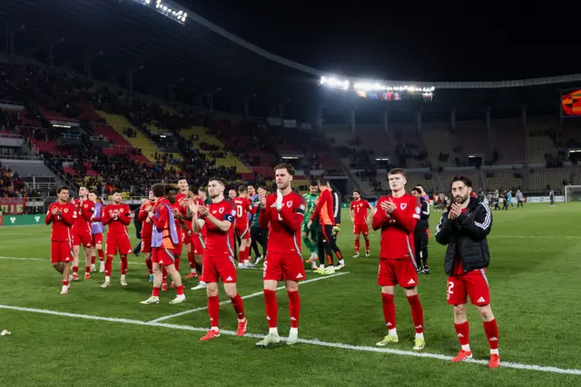 Wales players clap their fans in North Macedonia