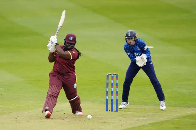 West Indies' Qiana Joseph (left) batting as England's Amy Jones fields as wicketkeeper during the third Women's One Day International match at The Cooper Associates County Ground, Taunton