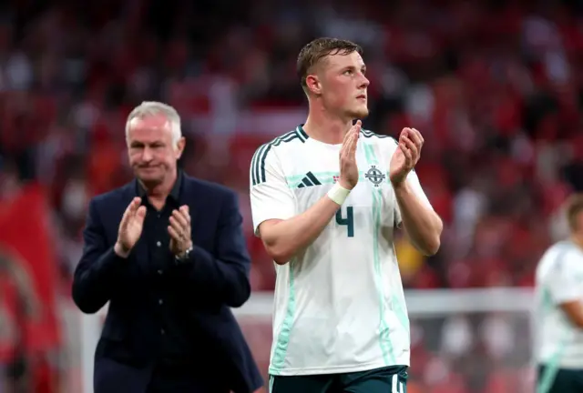 Ballard clapping the fans after the game
