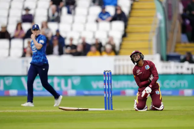 West Indies' Shemaine Campbelle (right) reacts after being struck by the ball during the third Women's One Day International match at The Cooper Associates County Ground, Taunton
